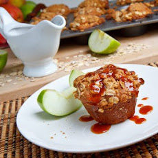 Cheesecake Stuffed Apple Muffins with Streusel Topping and Caramel Sauce