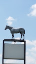 Horse On Top Of Sign