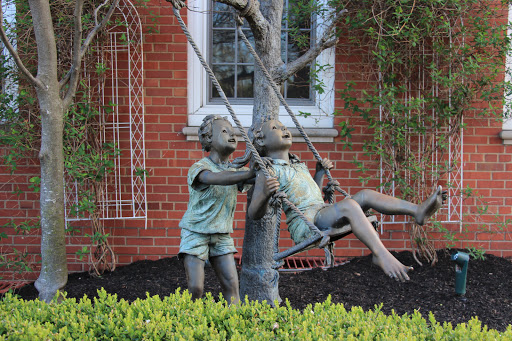 Children Swinging Statue