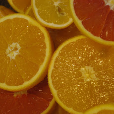 Cardamom vanilla broth with caramelized citrus segments