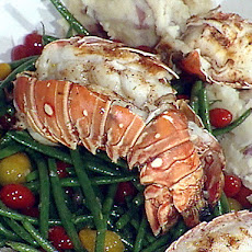 Grilled Spiny Lobster with a Warm Tomato Salad, Garlic Creamed New Potatoes and a Drizzle of White Truffle Oil