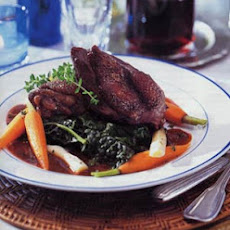 Chicken in Red Wine Sauce with Root Vegetables and Wilted Greens