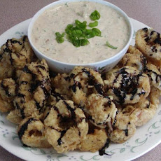 Fried Calamari With Remoulade Sauce Drizzled With Balsamic Syrup