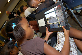 Photo of student looking at health messages.