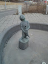 Child with Fish Fountain