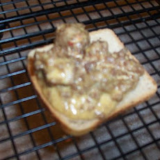Zesty Sausage Squares  (Appetizer)
