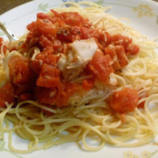 Tilapia Mediterranean over Angel Hair Pasta