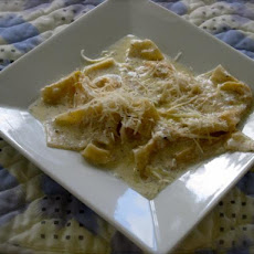 Pumpkin Wonton Ravioli W. Sage Butter Cream
