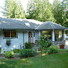 Private 3.3 acre with lovingly maintained rancher and shop.