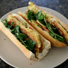 Curry Battered Barramundi Fillet Sandwiches with Garlic Mayo and Pickled Cucumbers