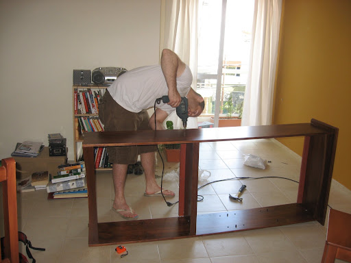Sasha working on a bookshelf for our new apartment.