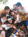 The guys dogpiling Zack in thanks for teaching them Futbol Americano