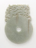 Disk (bi) with knobs, feline and dragon