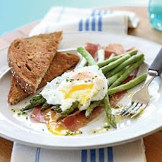 Asparagus Salad with Soft Poached Eggs, Prosciutto, and Lemon-Chive Vinaigrette