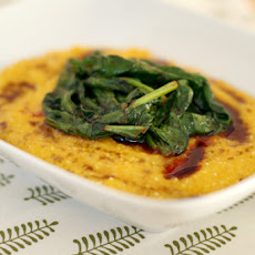 Creamy butternut squash polenta with spicy wilted spinach