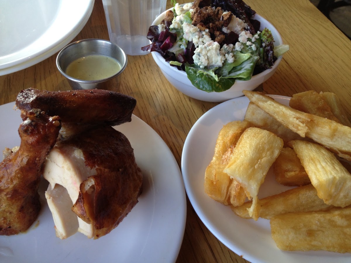 Dry rub roasted chicken, fried yucca and salad with candied pecans, blue cheese and buttermilk dress