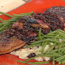 Seared Magret Duck Breast with Creamy Garlic Mashed Potatoes, Haricots Verts and Brandied Cherry Reduction Sauce