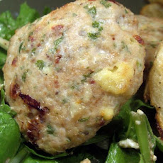 Chicken Tomato and Feta Patties on a Spinach Salad