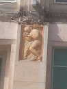 Statue on the Wall