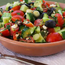 Chopped Tomato and Cucumber Salad Recipe with Mint, Feta, Lemon, and Thyme