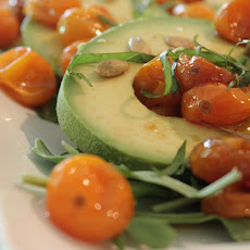Avocado With Pomegranate Molasses Tomatoes, Citrus, And Basil.