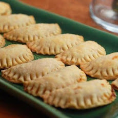 Chicken Empanada with Chorizo, Raisins, and Olives