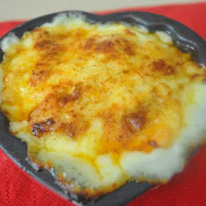 Quick and Easy Baked Stuffed Eggs With Cheese Sauce