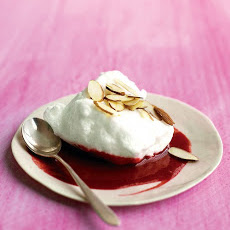 Soft Meringue Pillows with Raspberry Sauce