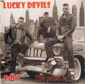 http://lh5.ggpht.com/Zombs1/SOskA5WCZDI/AAAAAAAACYg/P1v8ufcXL4o/s576/Lucky%20Devils%20-%20Time%20Passes%20By.jpg