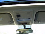 Rear view mirror with compass and temperature and sunroof controls