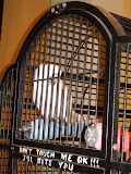 The cage informed visitors that he bites.