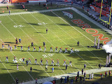 Cheerleaders leading the crowd in cheering on the Broncos.