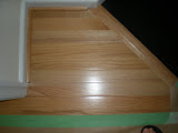 Back in the family room, a picture of the beautiful hardwood floors throughout the dining room and living room.