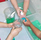 children doing water experiment