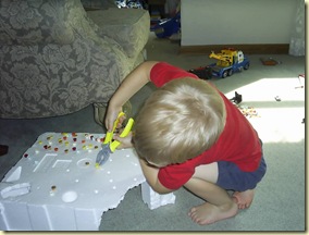 pulling golf tees (nails) out with pliers