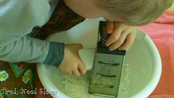 beginning to grate the soap 