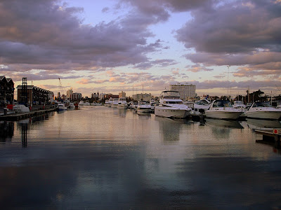 The sun starts to set near St. Kilda, Victoria, Australia.