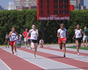 Sara Gildersleeve dueling Charmine Bien-Aime in the 100m semi-finals.