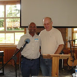 Vijay and Pastor John posing for the camera