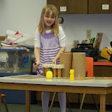Mackenzie playing with toys before the event
