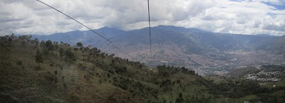 Panorama view of Medellin from once we'd popped over the side of the valley - the city immediately falls away and the view quickly becomes forrest. IMG_3714-IMG_3716.jpg
