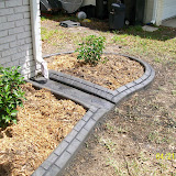 paver with gutter pad