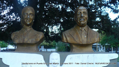 Bustos de Evita y Perón, escritos y manchgados con liquid paper
