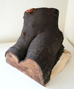 Mama I cant feel my knees                wood sculpture    by Gilbert Castro
