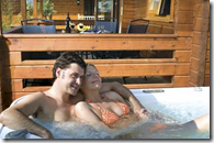 Enjoy a Dip in the Private Log Cabins