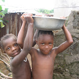  &ndash; Boys with bowl on head. Freetown SL June 10, 2007 (James Mansaray, photography)