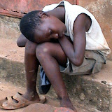  &ndash; Young man weary with hunger. Kabala 2006 (picture taken by James Mansaray)