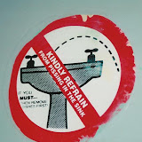  &ndash; Found on bathroom door of "fancy" restaurant in Freetown 2002 (V Hicks, photographer)