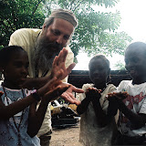  &ndash; Fr. Seraphim playing games with the children (James B. Mansaray, photographer)