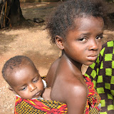 &ndash; Young girl caring for her sibling. No parents around. Freetown, Sierra Leone. ©2007 NHA JMansaray photographer